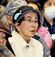 名護市安部のオスプレイ墜落事故から１年を機に開かれた抗議集会で、登壇者のあいさつに耳を傾ける横田チヨ子さん＝２０１７年１２月