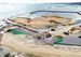 大浦湾側に新たな護岸を造るため、海岸（手前中央）に石材を敷き詰める作業が進められた＝２０１９年１月２８日、沖縄県名護市辺野古（小型無人機で撮影）