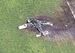 墜落・炎上したメッシュ・サポートの小型飛行機＝１２日、伊江村・伊江島空港敷地内（ＮＨＫニュースより）