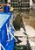 米海軍厚木基地の格納庫で泡消火剤の放出後、清掃を行う民間業者＝２０１６年、神奈川県（米情報公開法で入手）