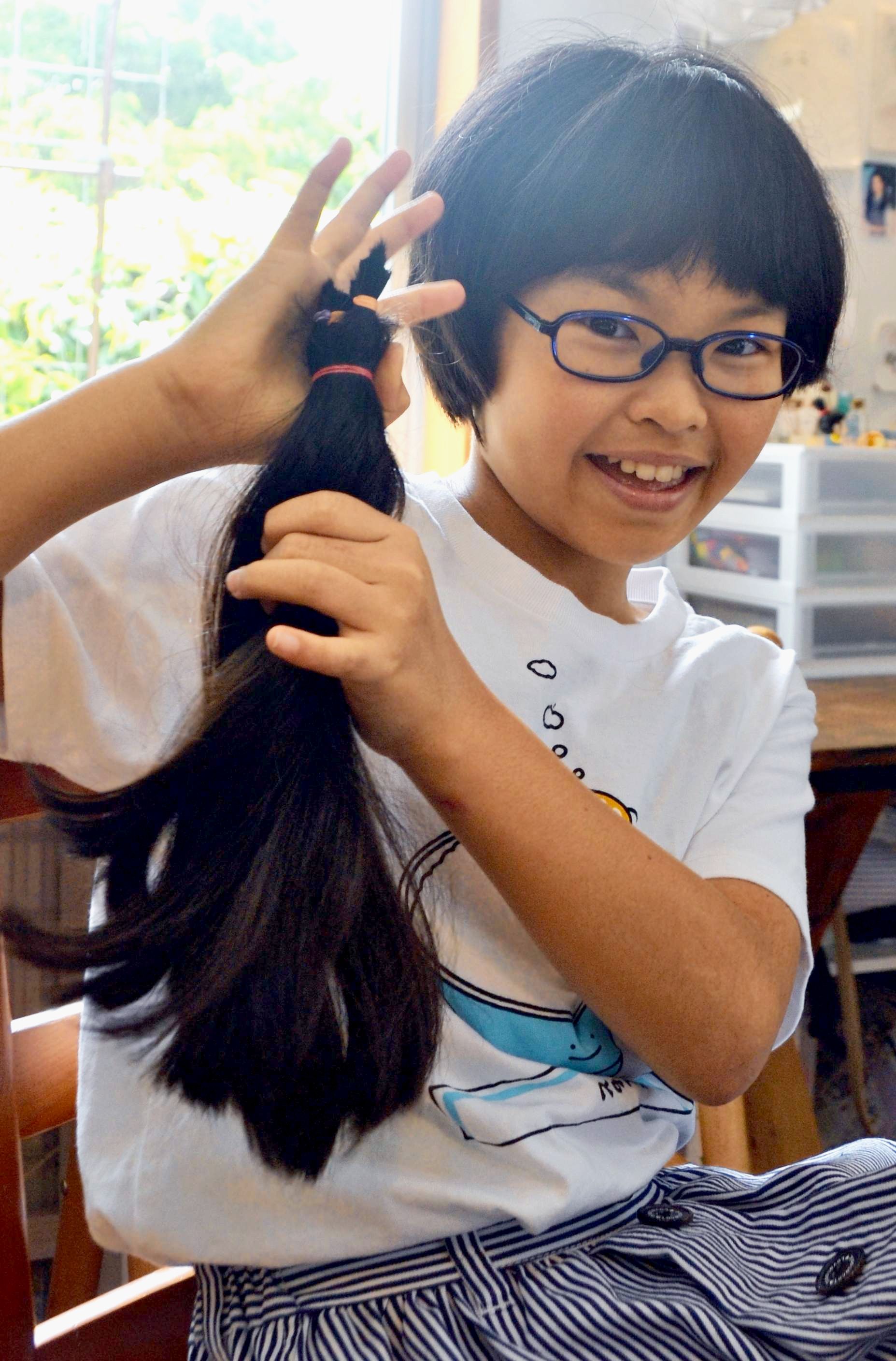髪伸びるようワカメも多く食べた ２年かけ長さ30センチ以上に 沖縄の小6 病児に寄付 沖縄タイムス プラス ニュース 沖縄タイムス プラス
